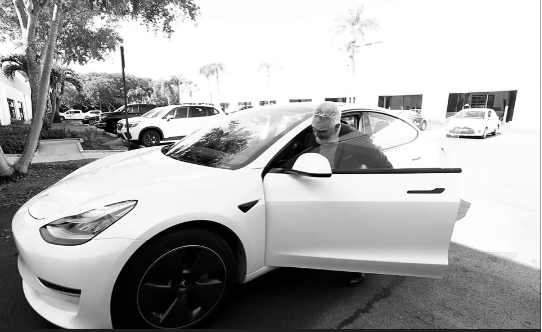 man and car image